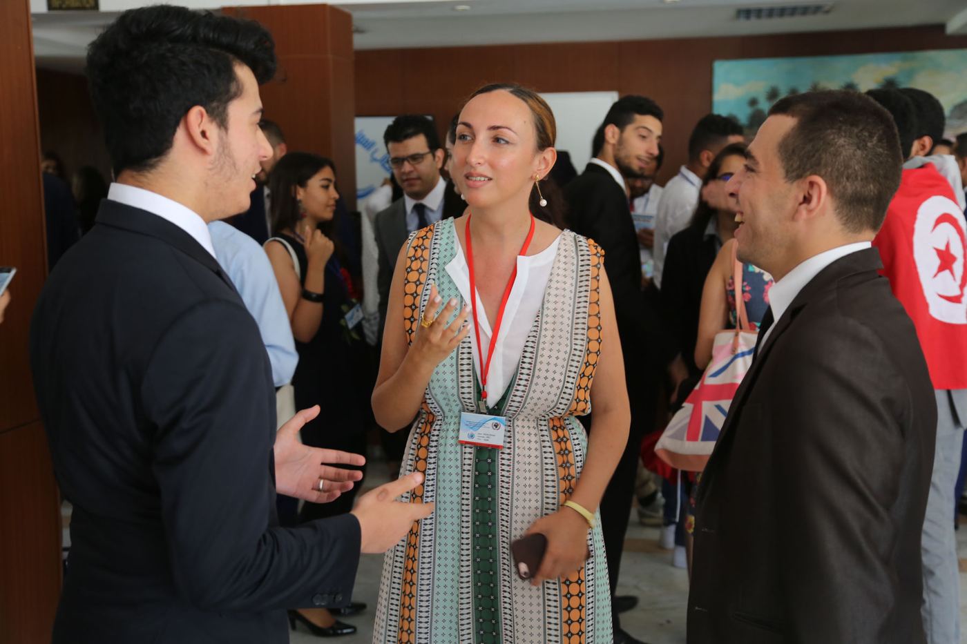 Delegates in conversation during a break