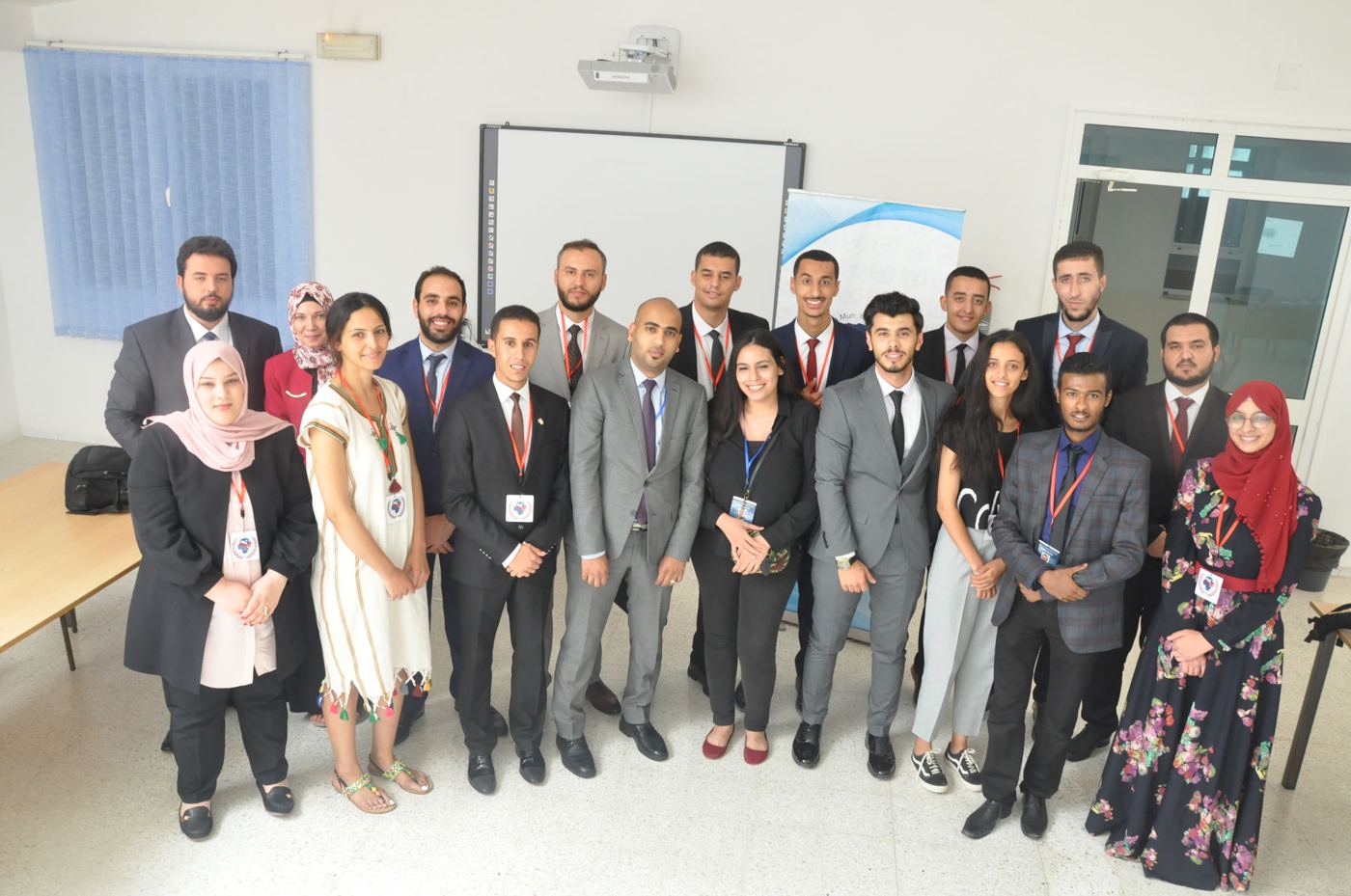 A cohort of AOD participants in formal dress