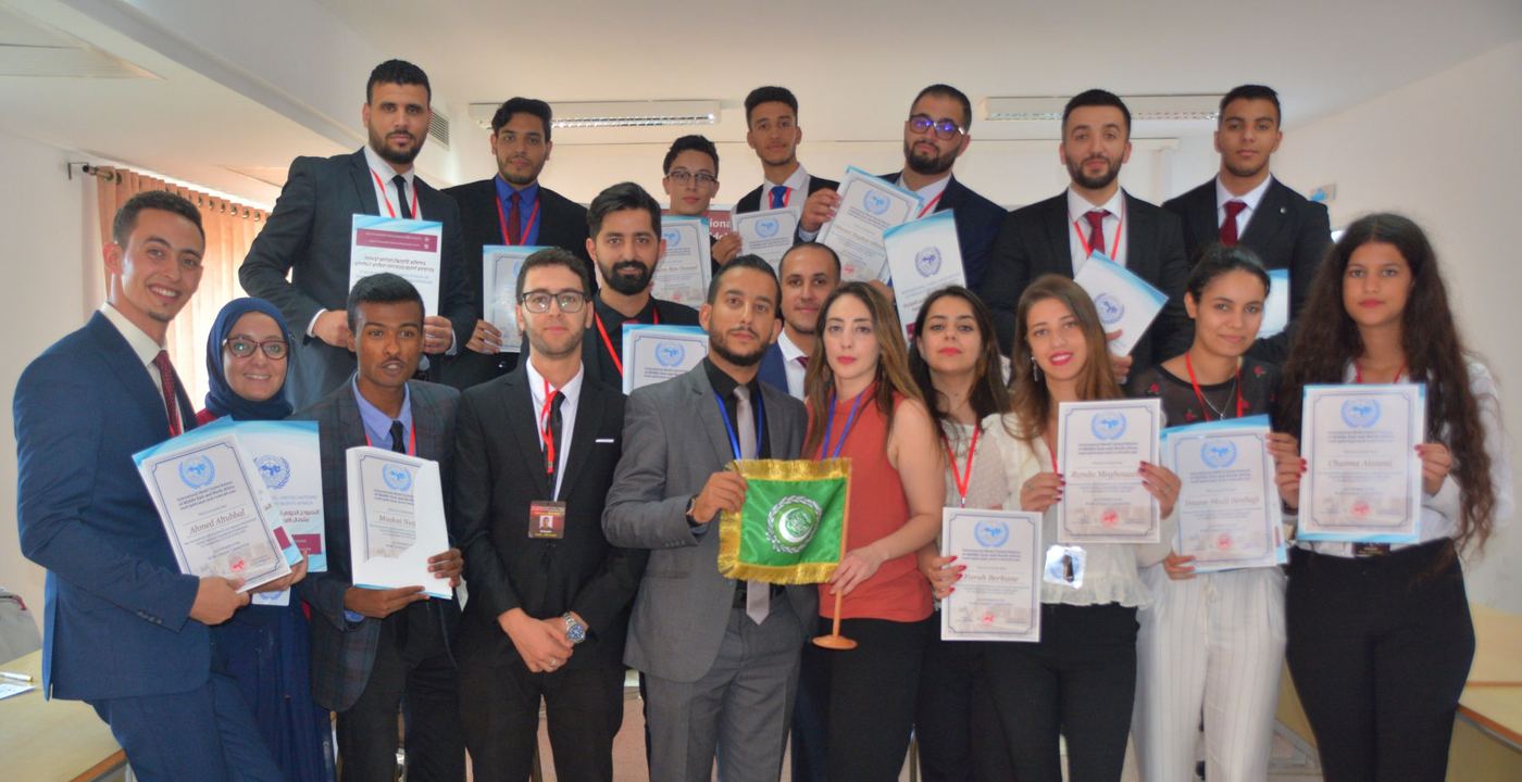 Participants holding their certificates